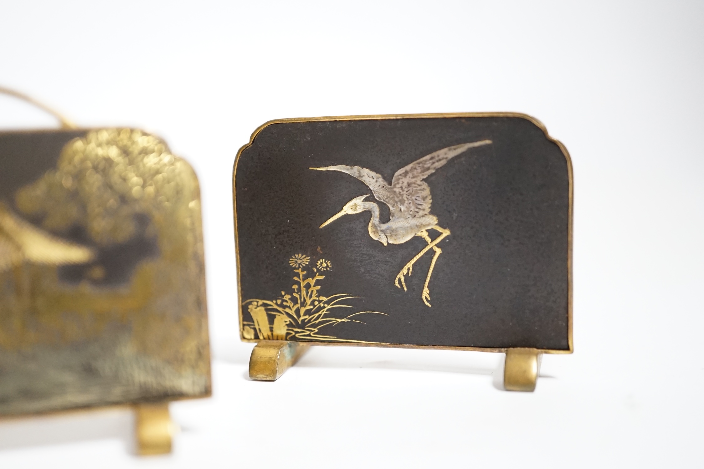 Three Japanese gold damascened iron menu holders by S. Komai, in original box, each 5cm wide